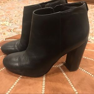 Black leather heeled boots, size 6